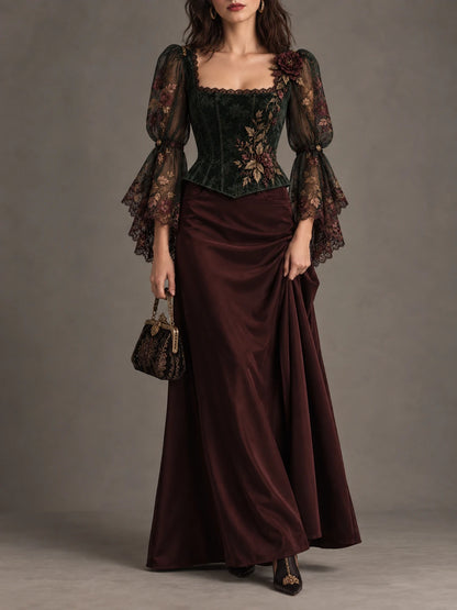 Back view of forest green corset top with floral embroidery and lace-up closure