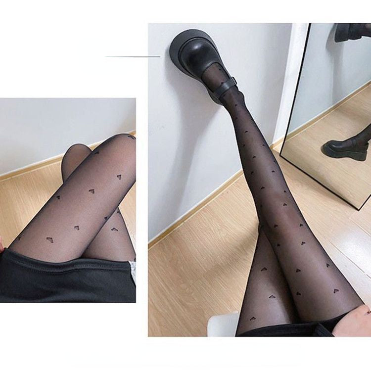 Black silk through flesh padded pantyhose